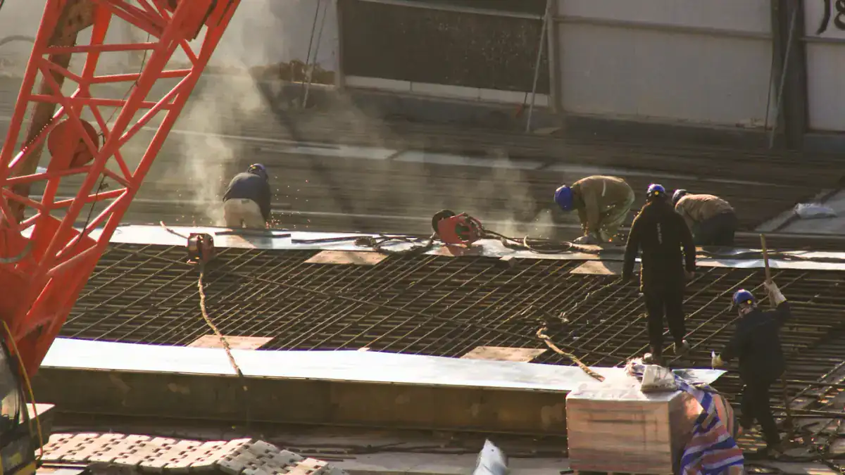 Construction crew working on a slab