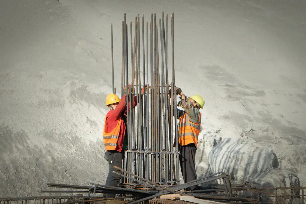 Steel fixers tying a column cage
