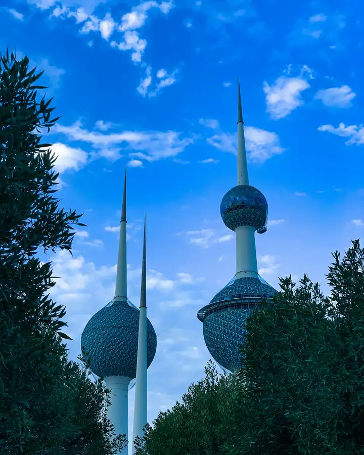 The spheres of Kuwait Towers against a blue sky