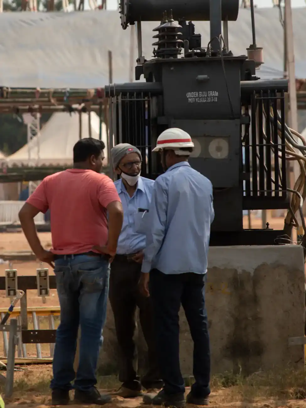 Site engineers planning work with a supervisor