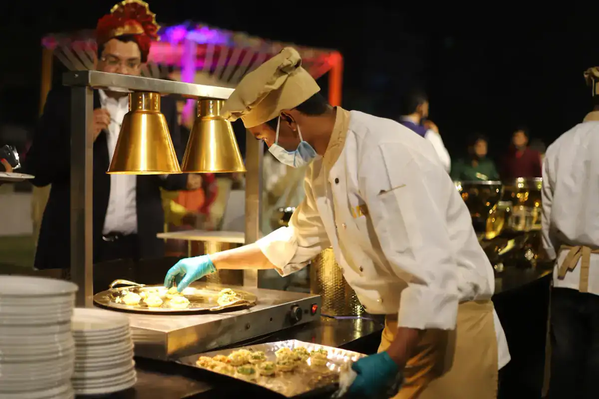 Catering staff serving at a hotel buffet