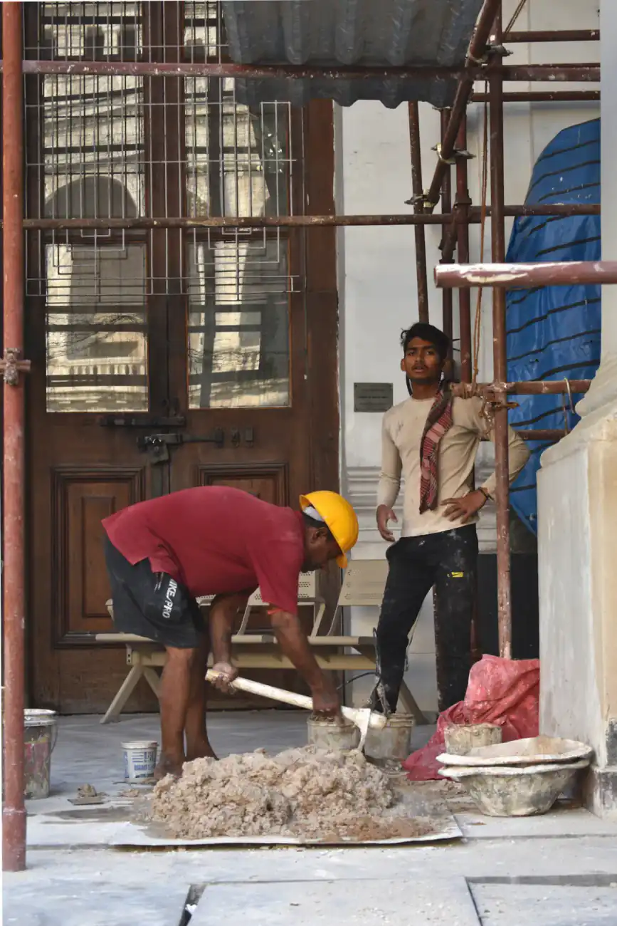 Construction helper at work on a site